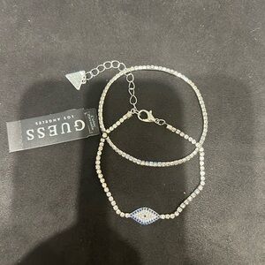 GUESS Silver Crystal Bracelet Trio with Blue Accent Eye